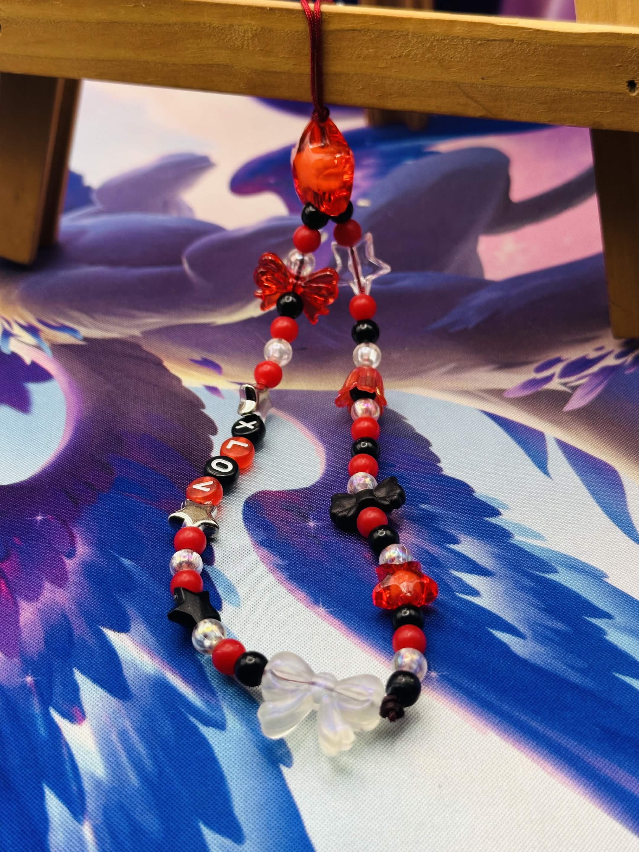XLov Beaded Phone Charm 🌟